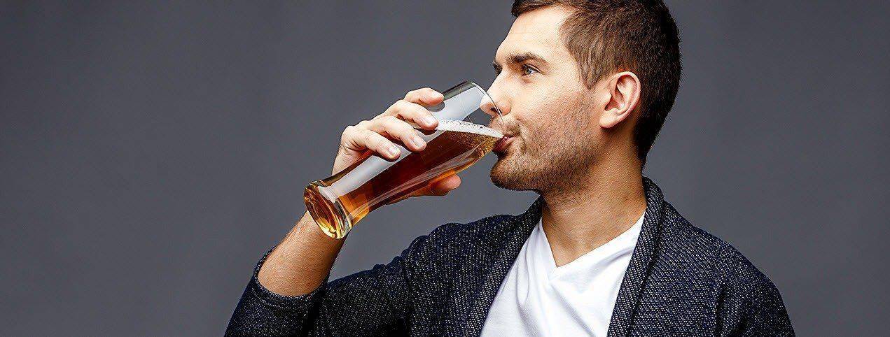 Man drinking Belgian Beer